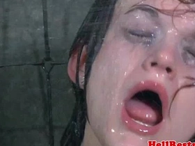 Submissive woman in bondage receives rough punishment from dominant partner