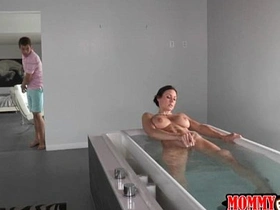 Secretly spying on busty stepmom's solo playtime in the bath