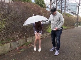 Shaved Asian girl masturbates with a remote controlled toy outdoors