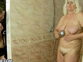 Steamy shower leads to intense hardcore sex with natural boobs